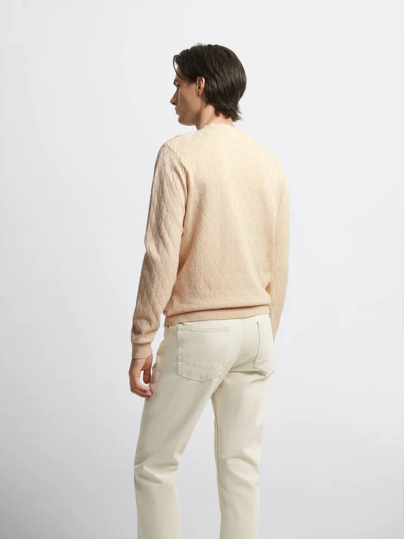 Pull col V tricotage fantaisie
