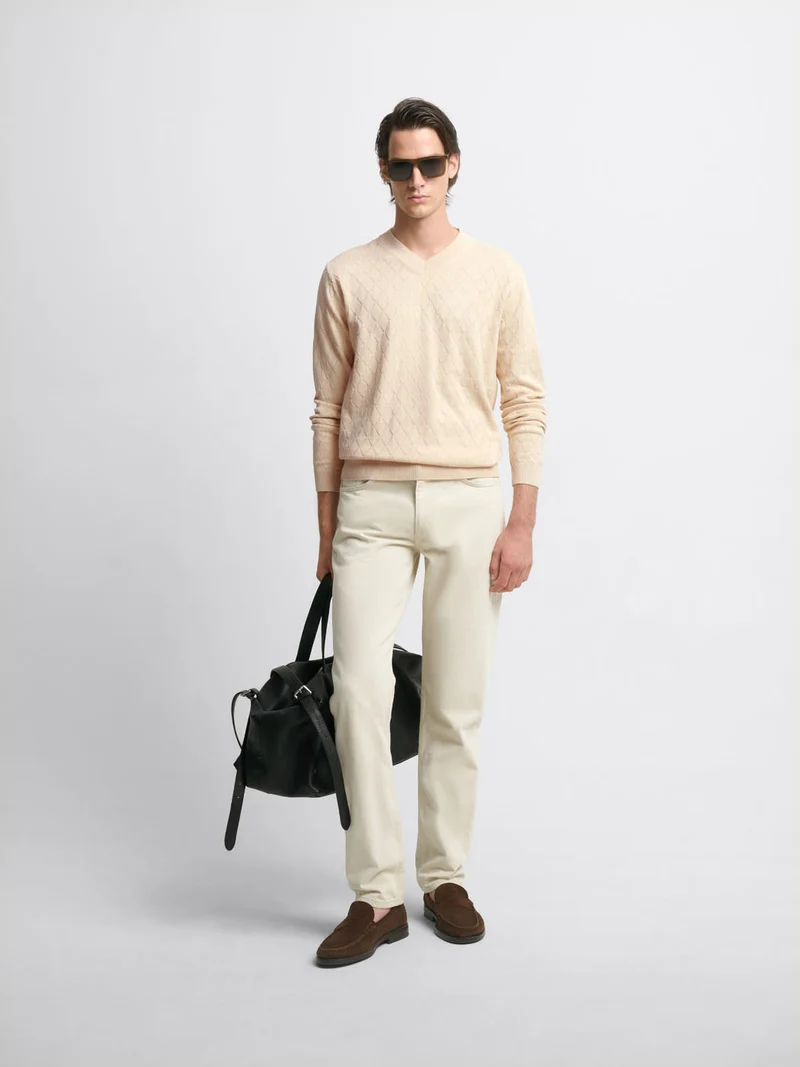 Pull col V tricotage fantaisie