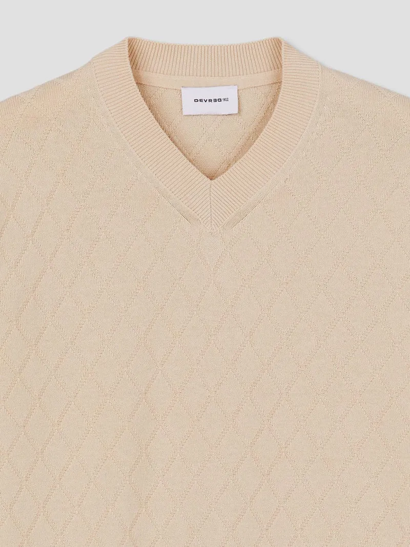 Pull col V tricotage fantaisie