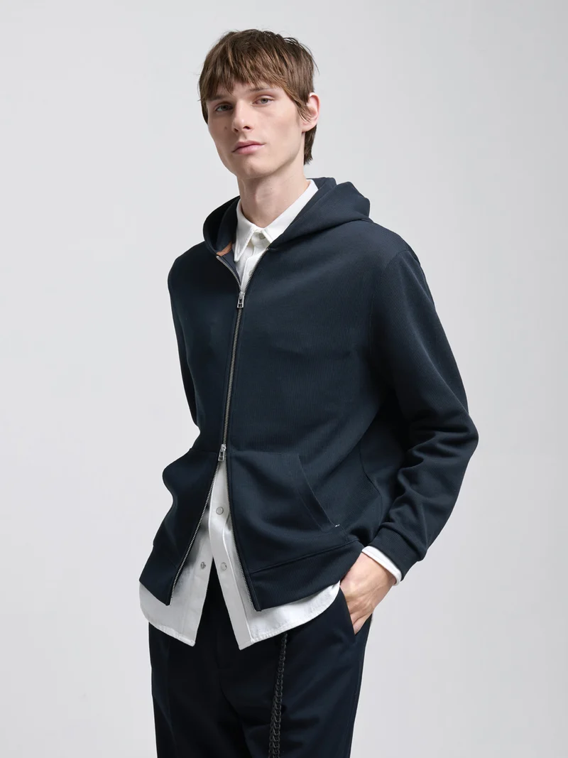 Sweat à capuche - L'Atelier