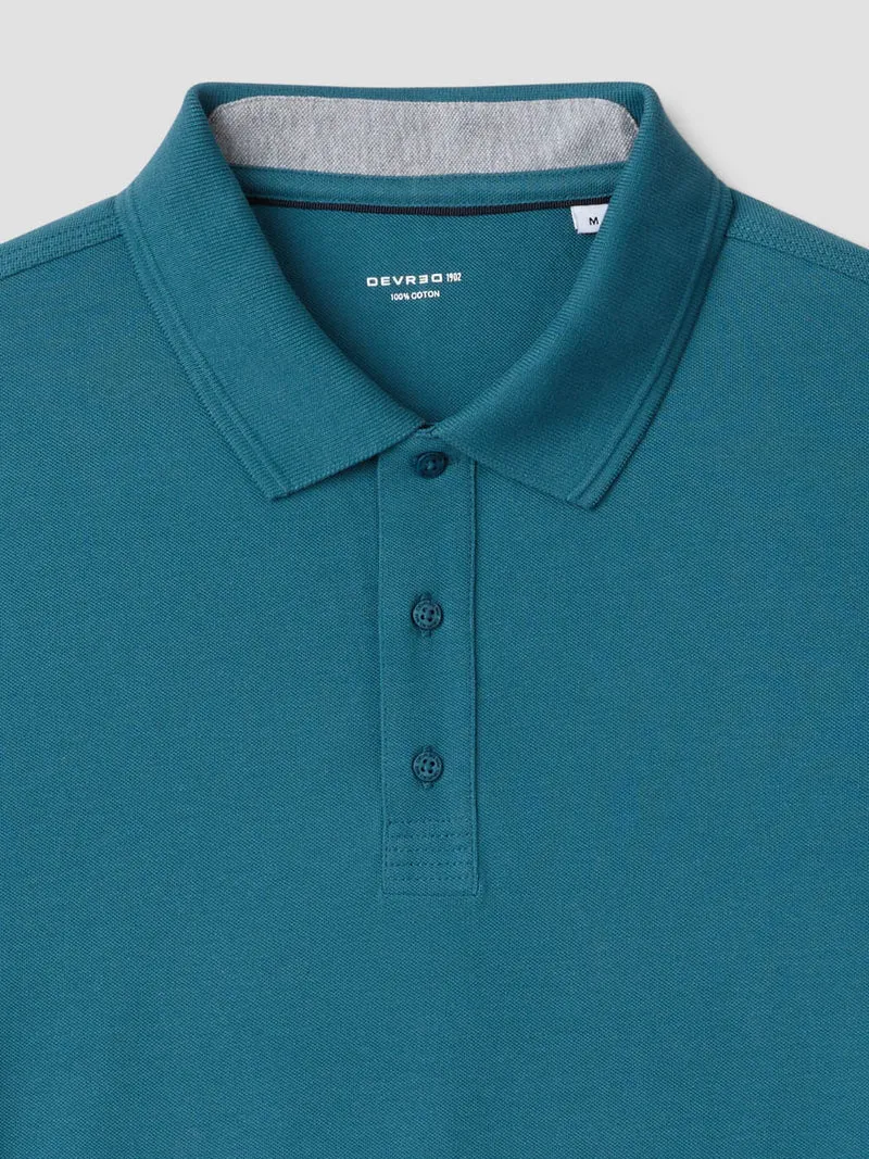 Polo col boutonné en coton