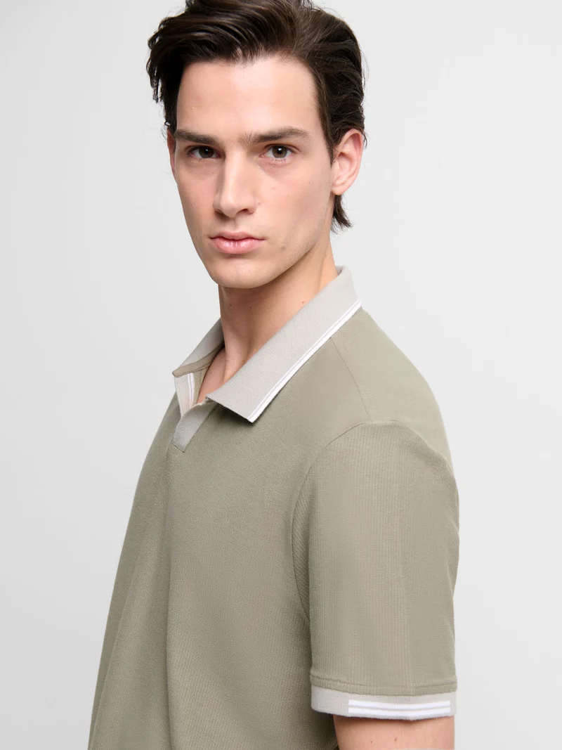 Polo col ouvert