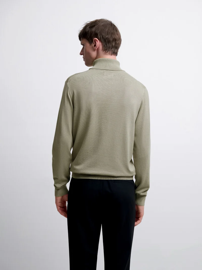 Pull col roulé en jersey