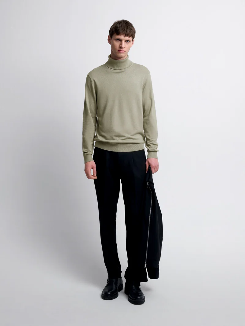 Pull col roulé en jersey