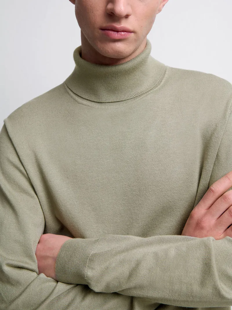 Pull col roulé en jersey