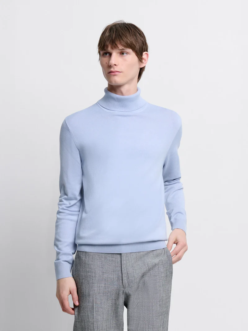 Pull col roulé en jersey
