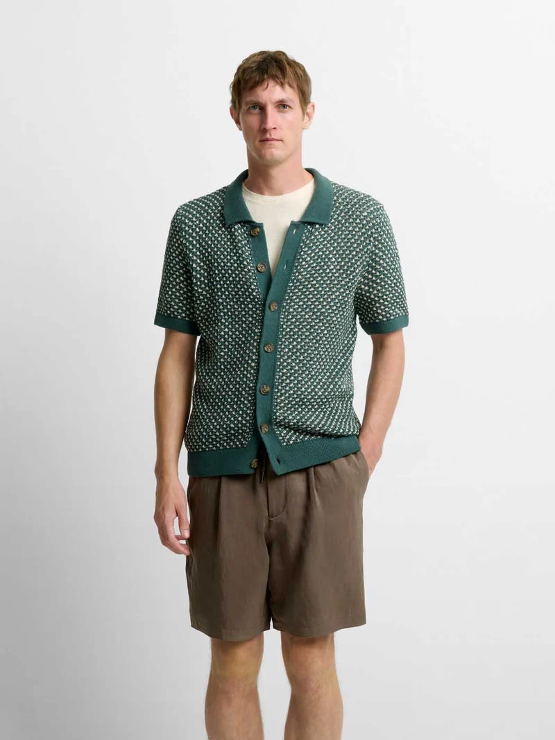 Chemise en maille col montant
