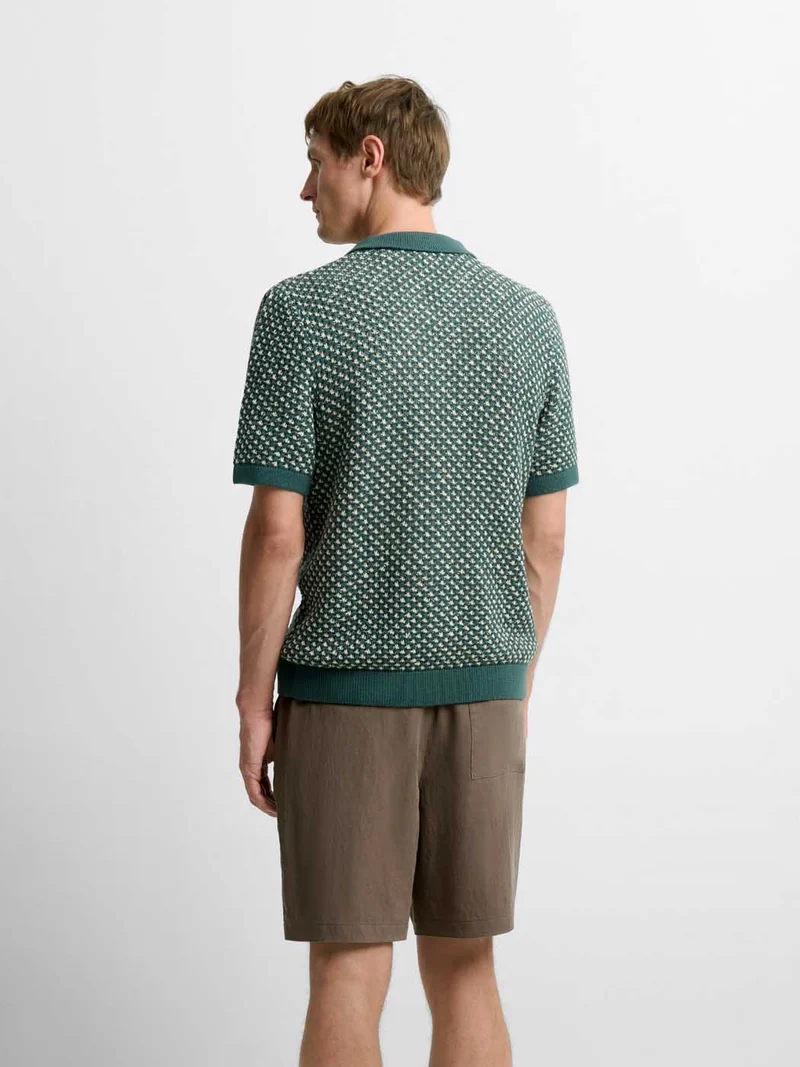 Chemise en maille col montant