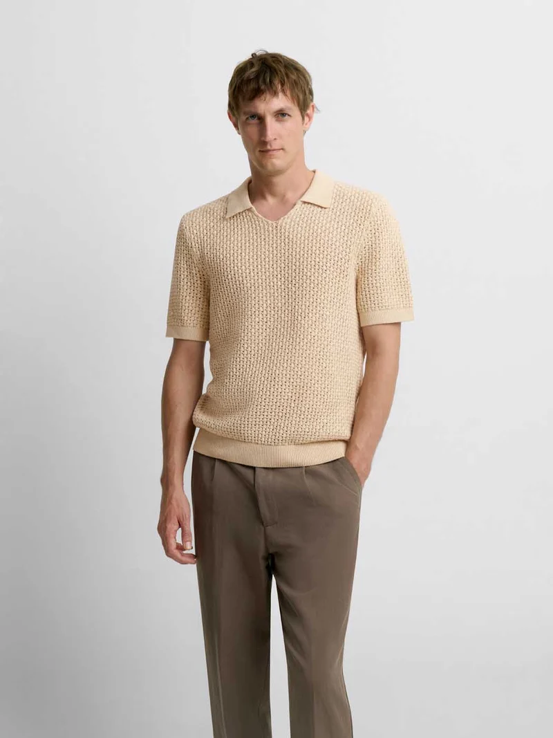 Polo maille col V ajouré
