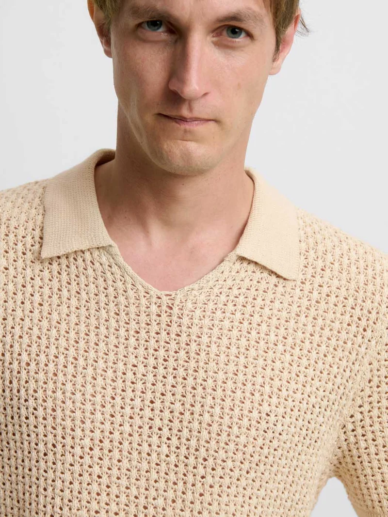 Polo maille col V ajouré