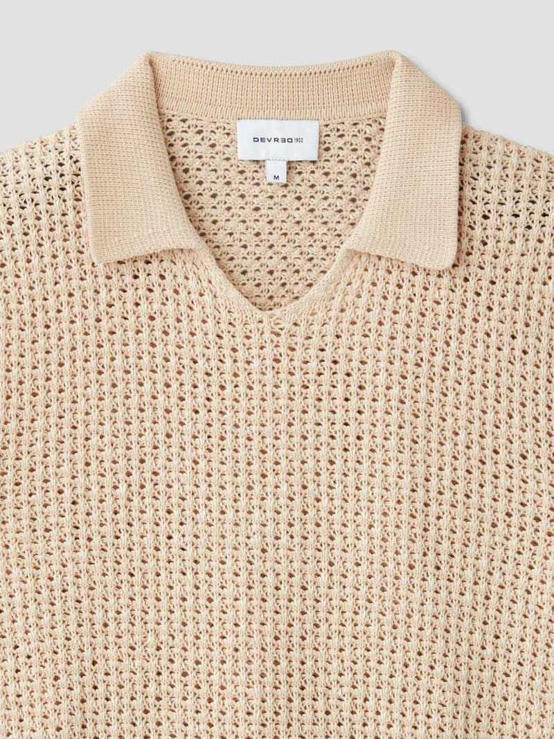 Polo maille col V ajouré