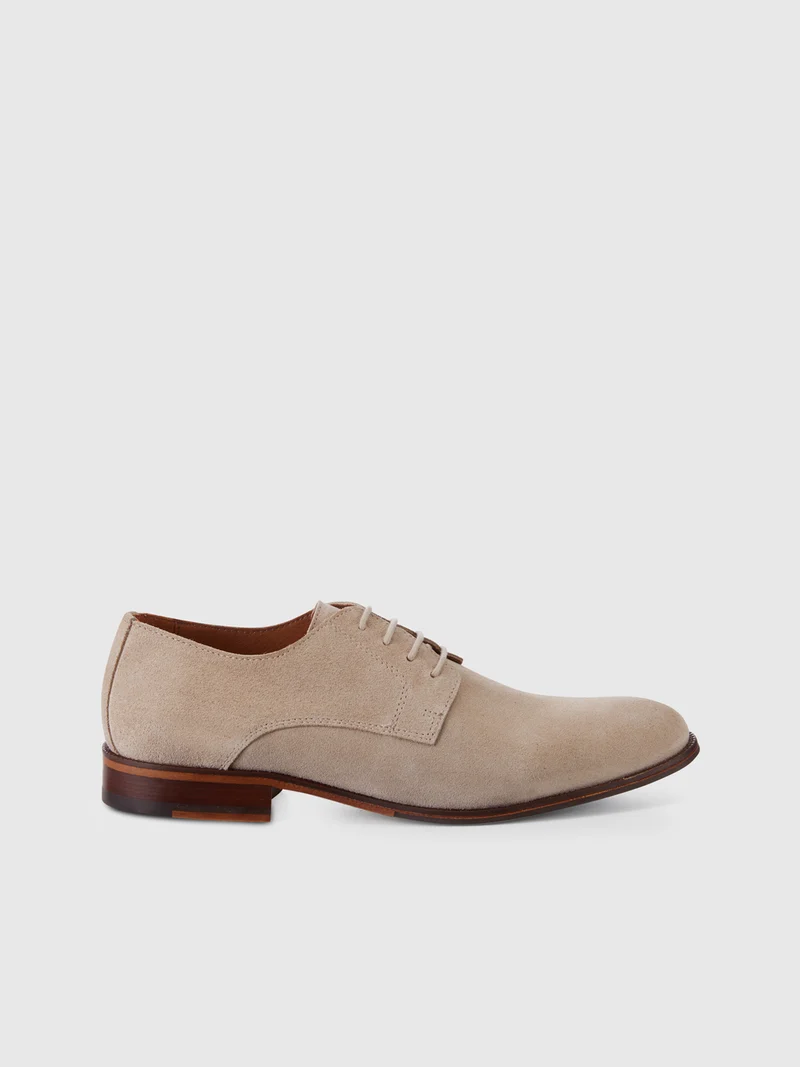 Derbies en cuir suédé