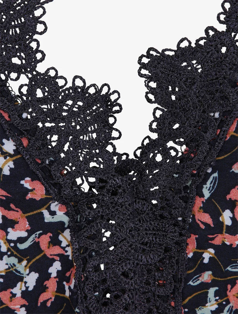 Robe longue à fleurs graphiques et à fines broderies - Marine