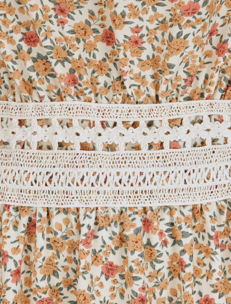 Robe longue à imprimé fleuri et taille brodée - Orange