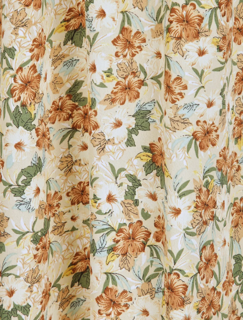 Robe longue fleurie et à fines broderies - Beige