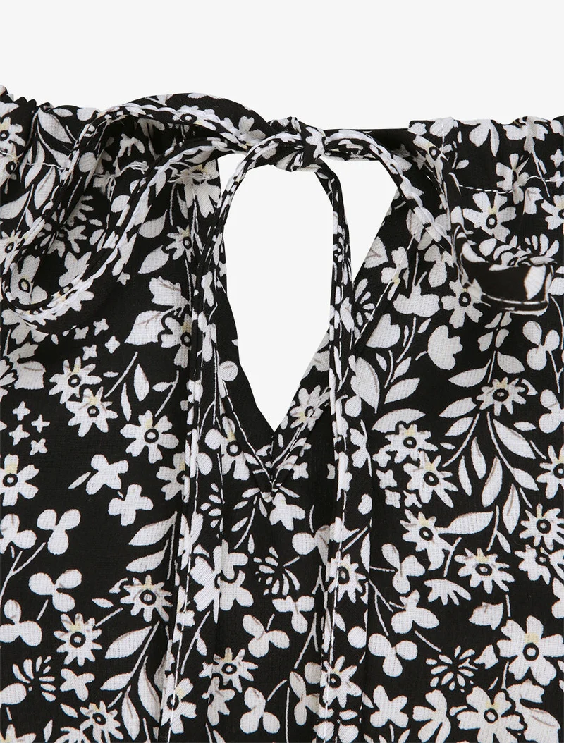 Robe longue à motifs fleuris et taille brodée - Noir