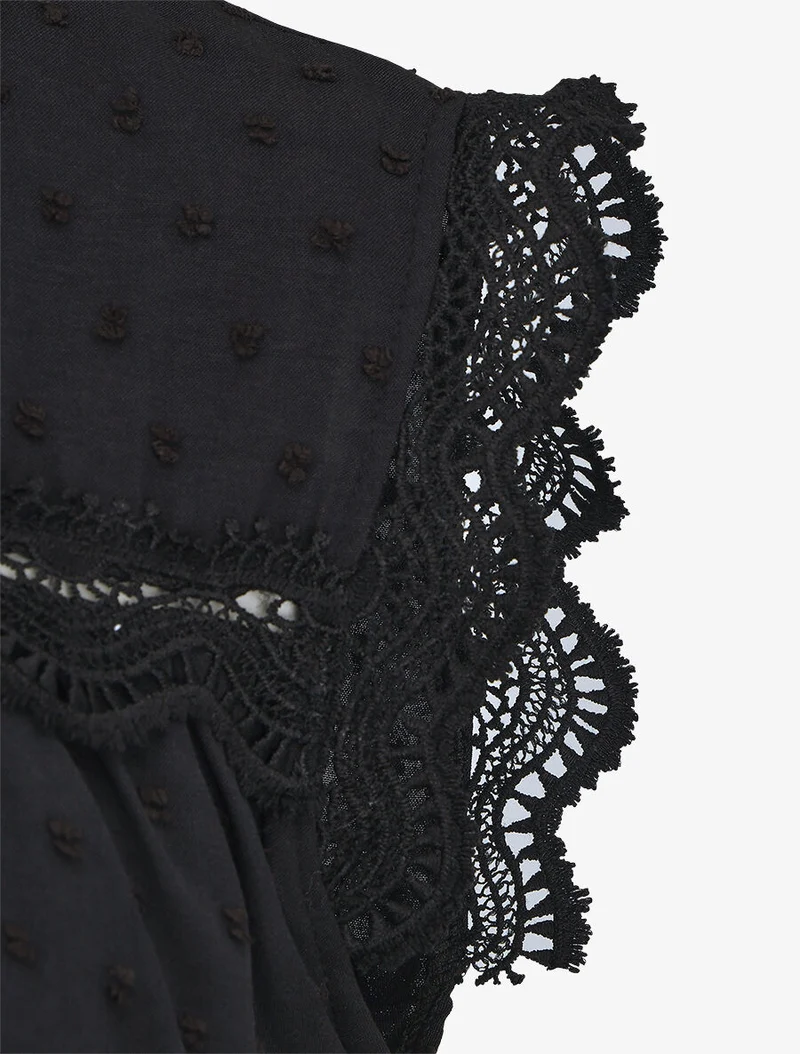 Blouse unie sans manches texturée - Noir