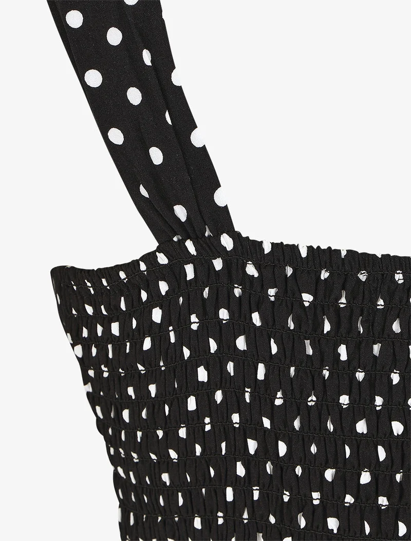 Robe longue à pois sans manches - Noir