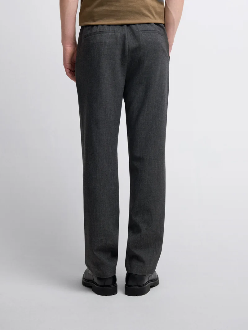 Chino à pinces chiné