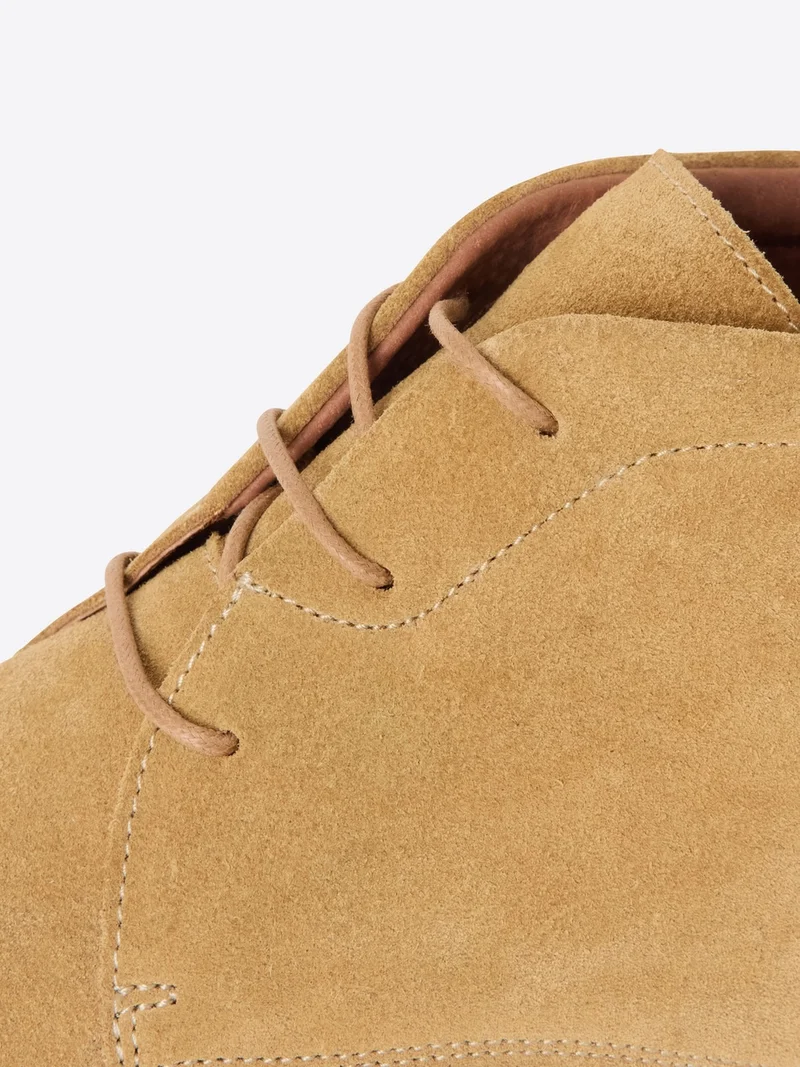 Bottines en cuir suédé