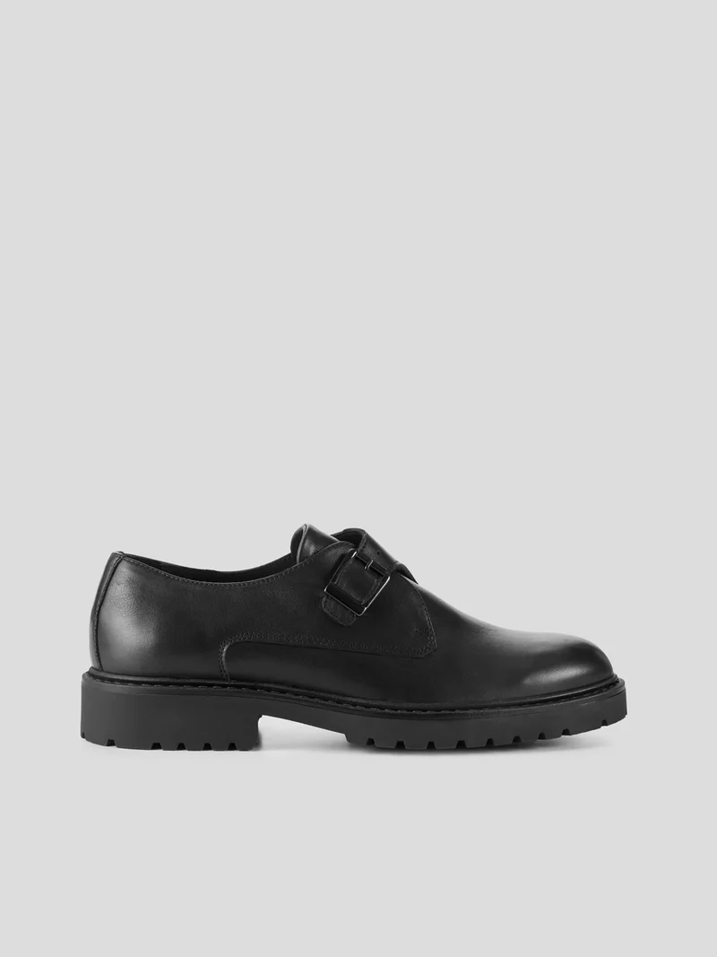 Derbies à boucle en cuir