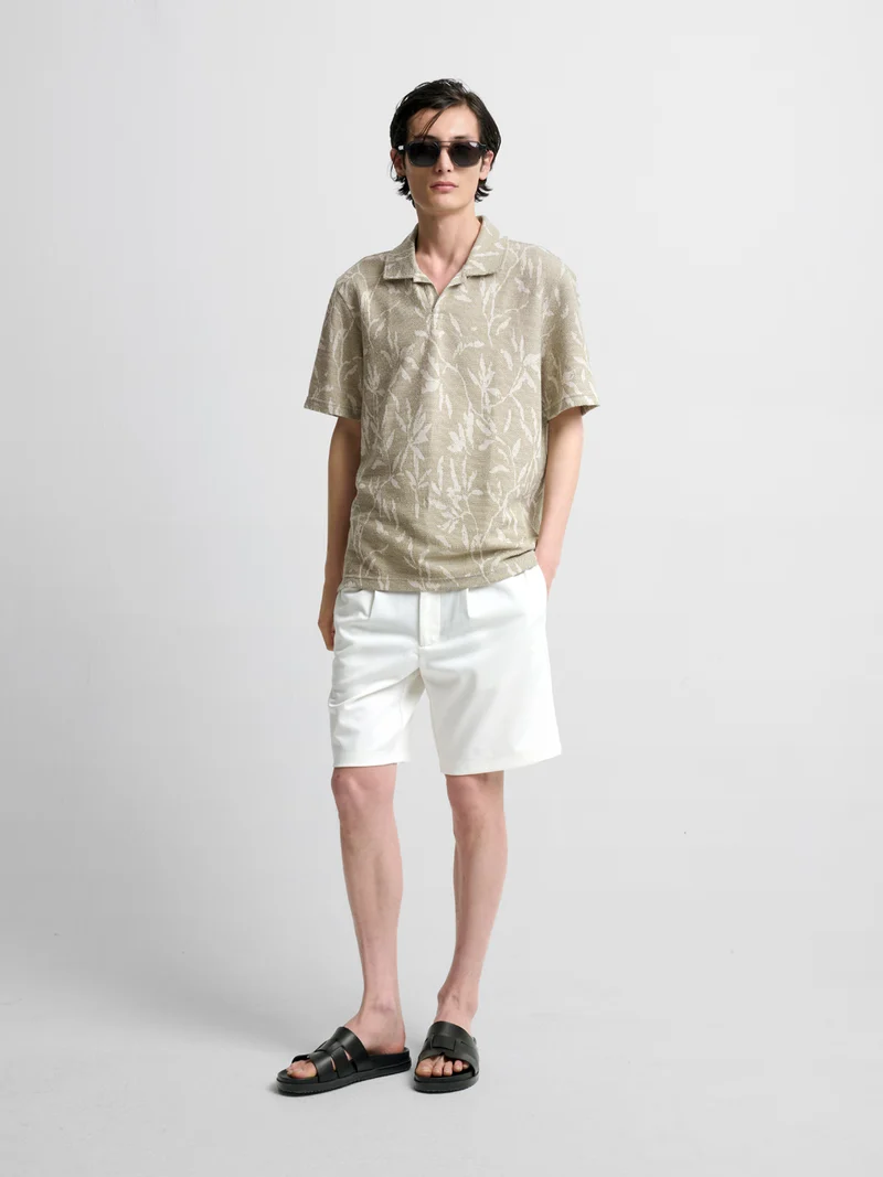 Polo col ouvert à motifs