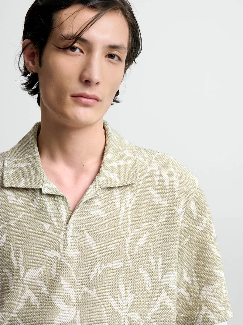 Polo col ouvert à motifs