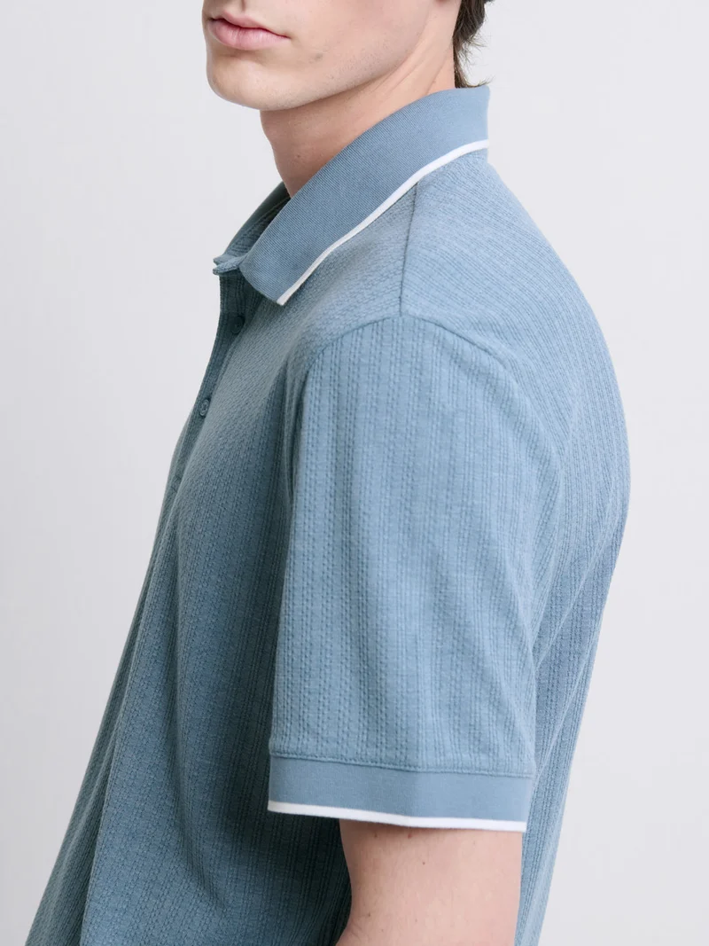 Polo col boutonné