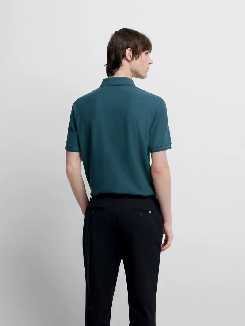 Polo col boutonné gauffré