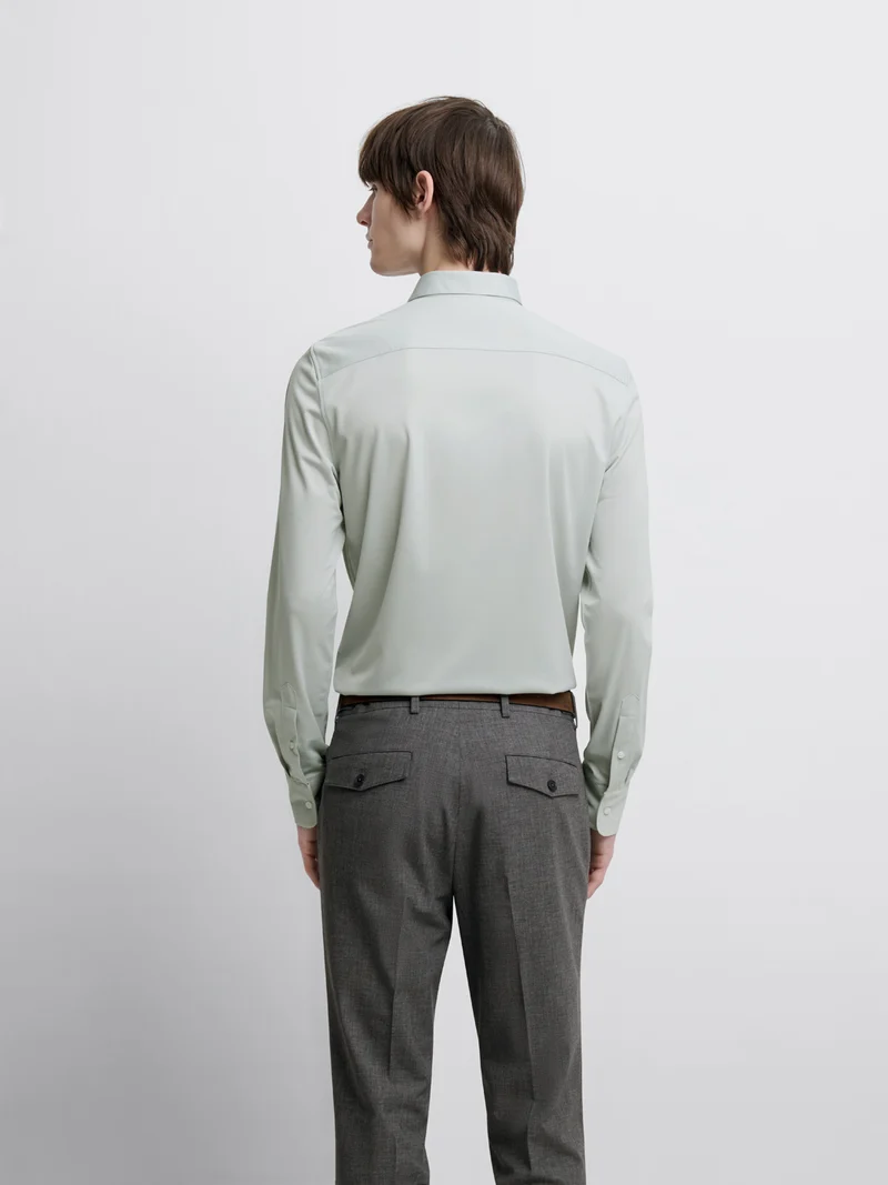 Chemise extraslim tissu traveler