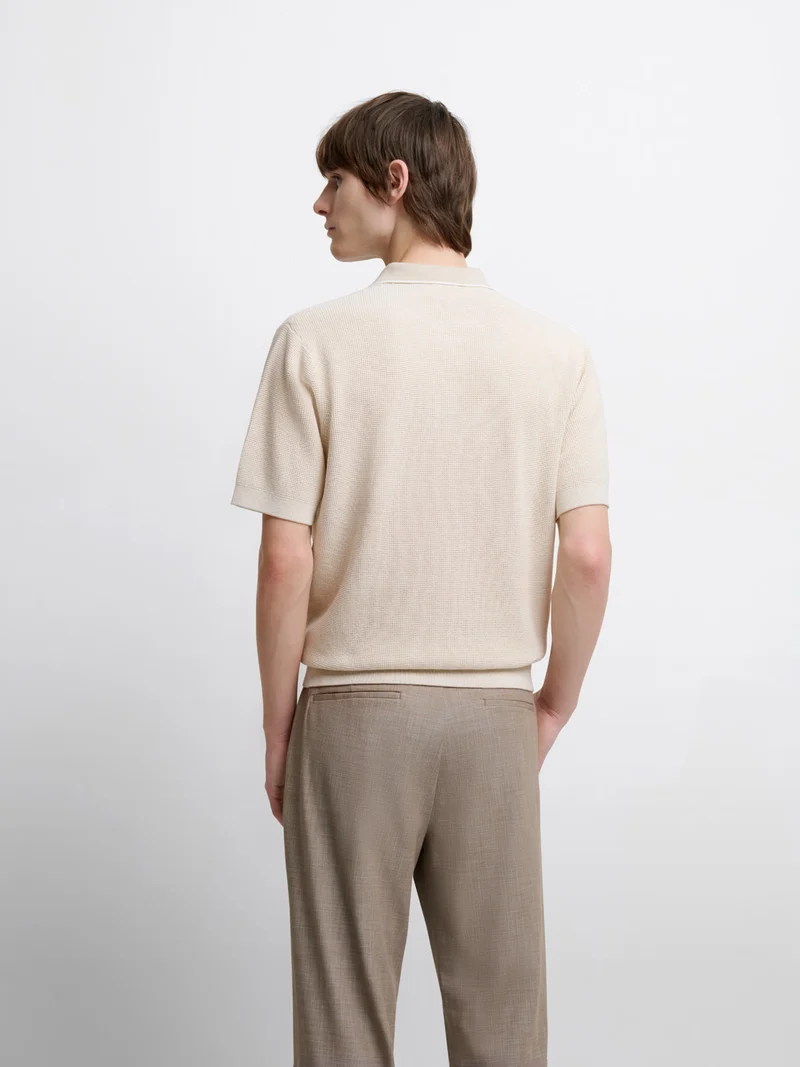 Polo col zippé en coton bio