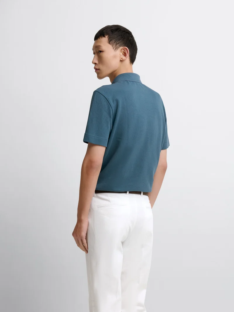 Polo col boutonné en coton