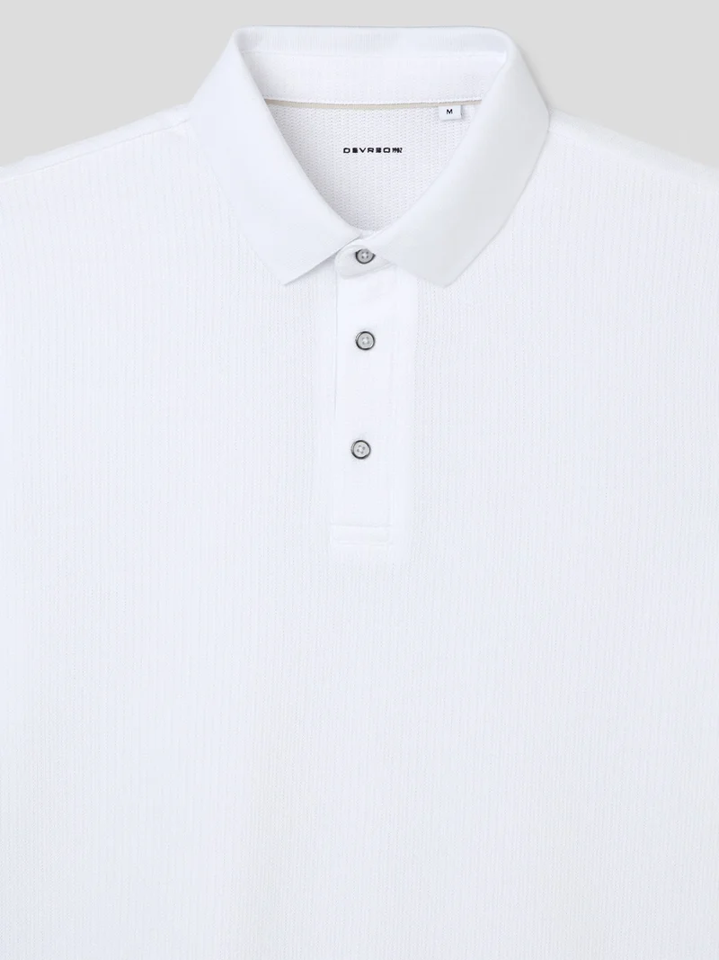 Polo col boutonné en coton