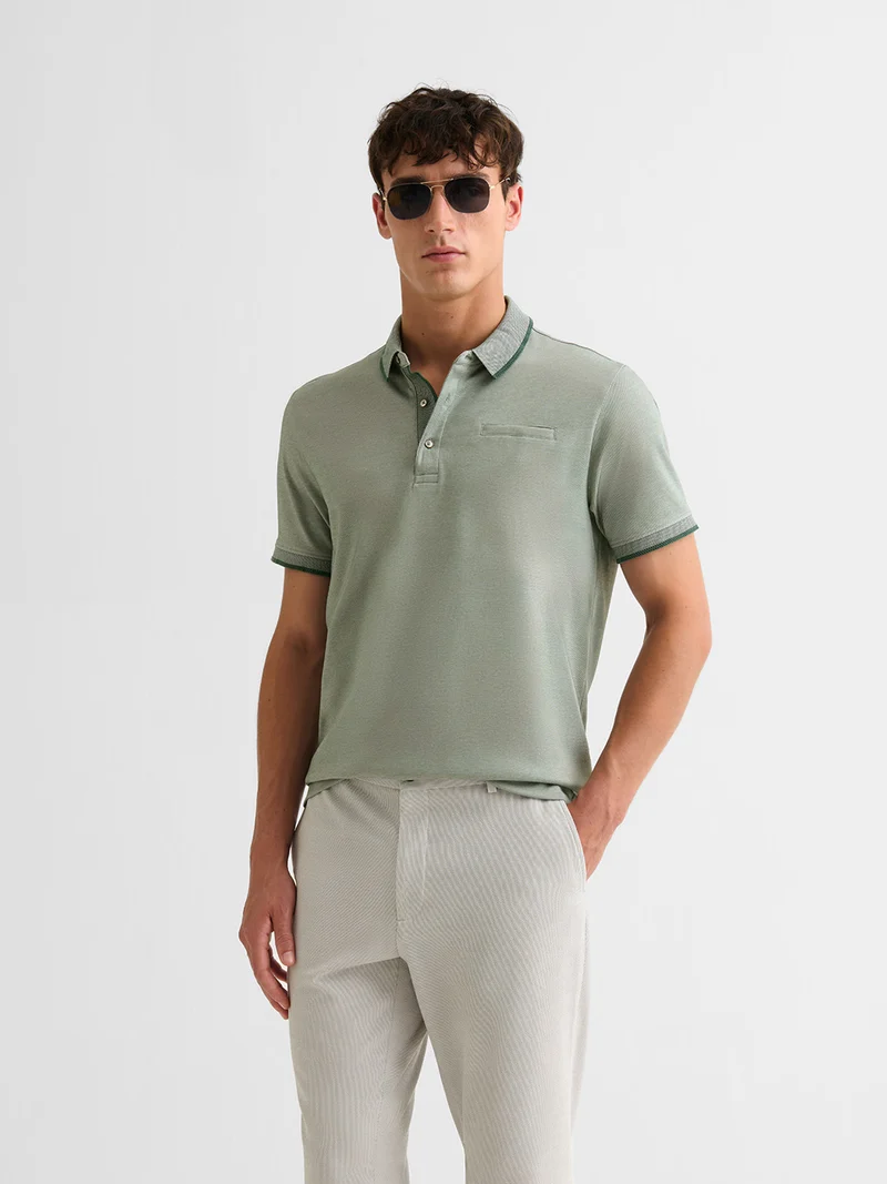 Polo boutonné chiné