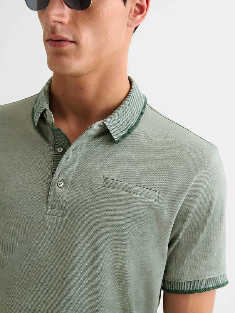Polo boutonné chiné