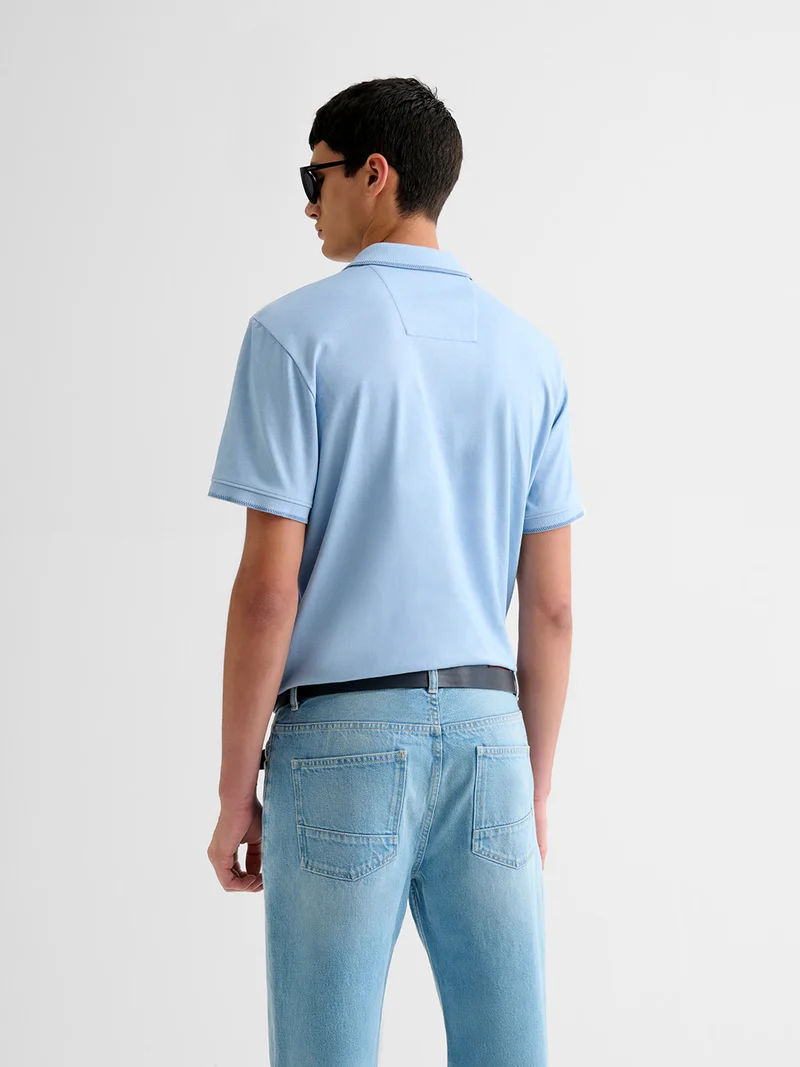 Polo boutonné chiné