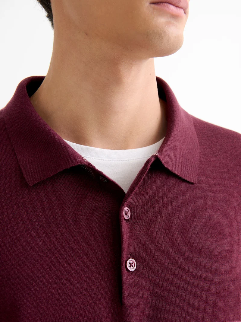 Polo boutonné en laine Mérinos
