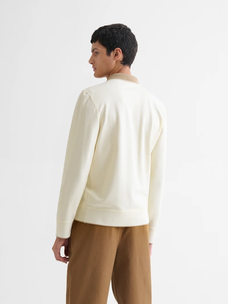 Polo manches longues col boutonné