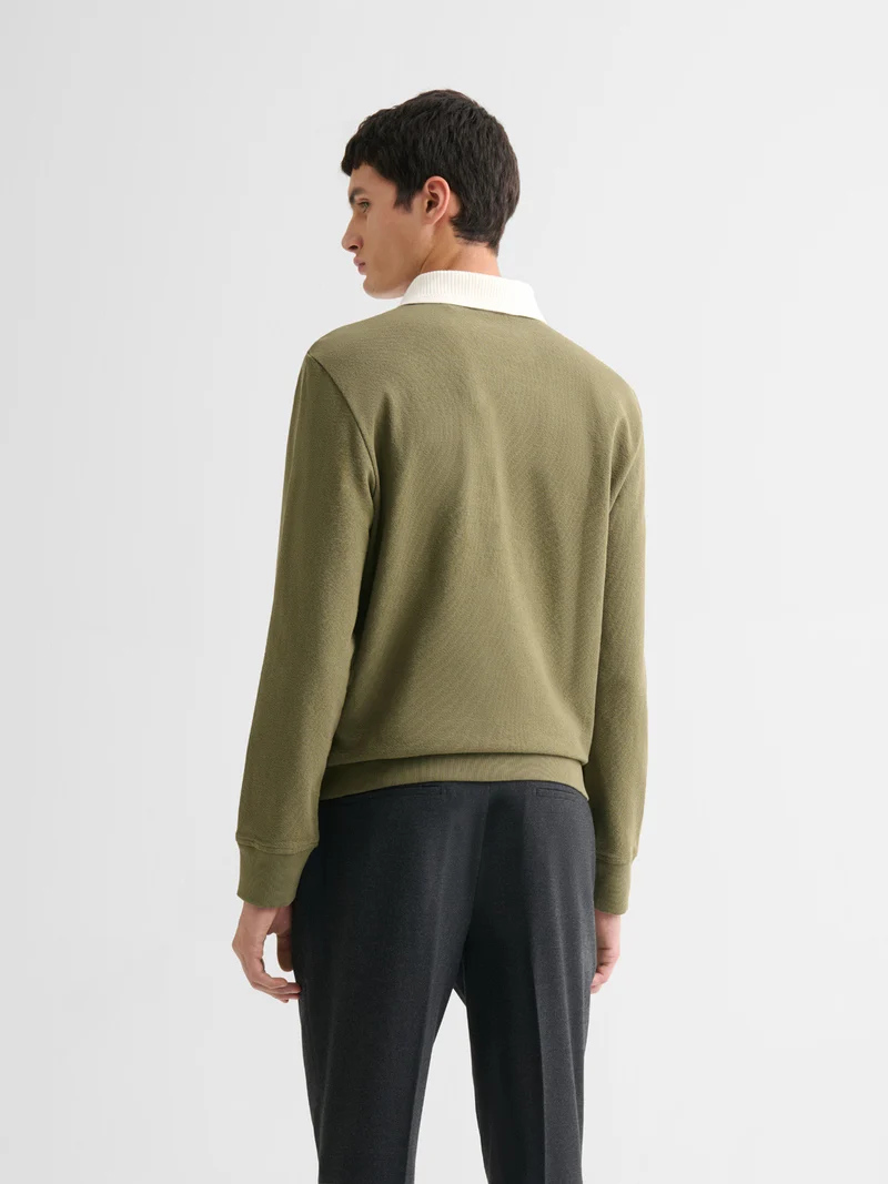 Polo manches longues col boutonné