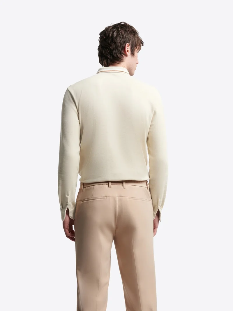 Polo manches longues en coton gaufré