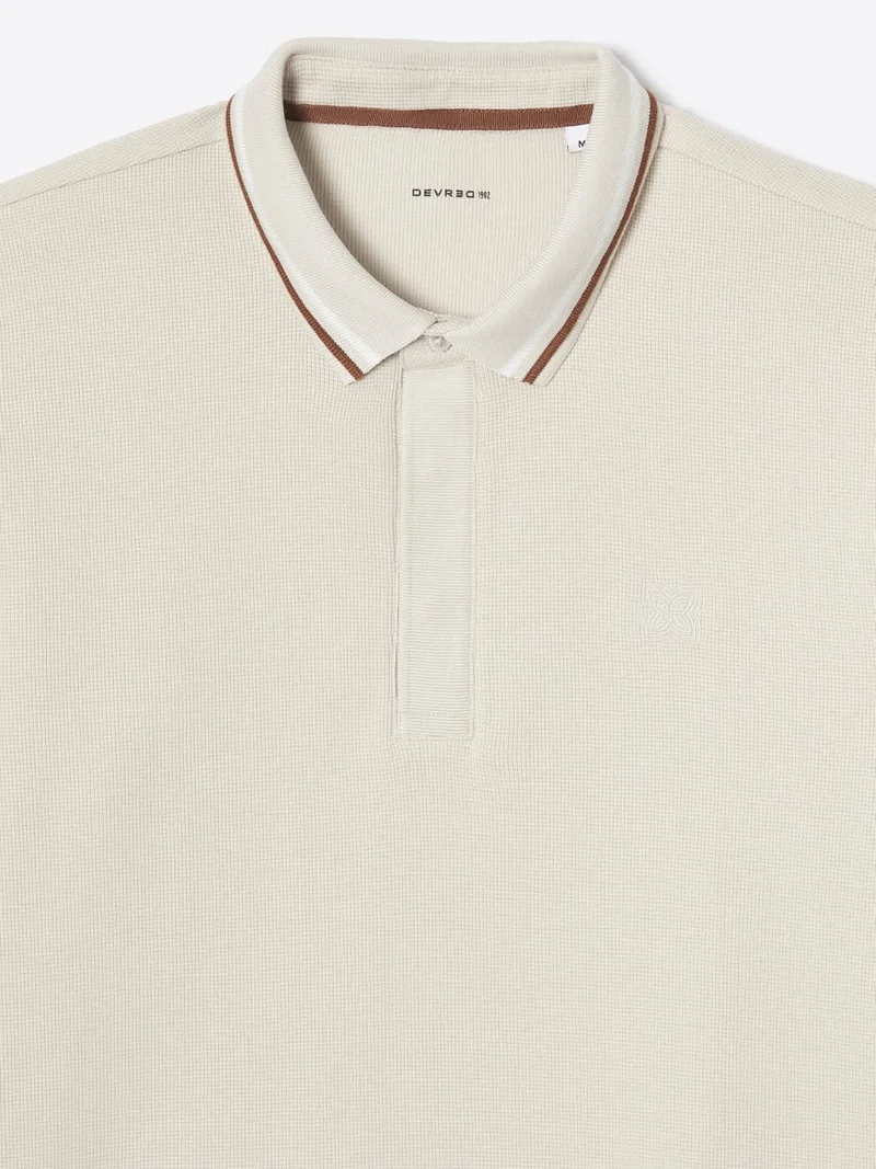 Polo manches longues en coton gaufré