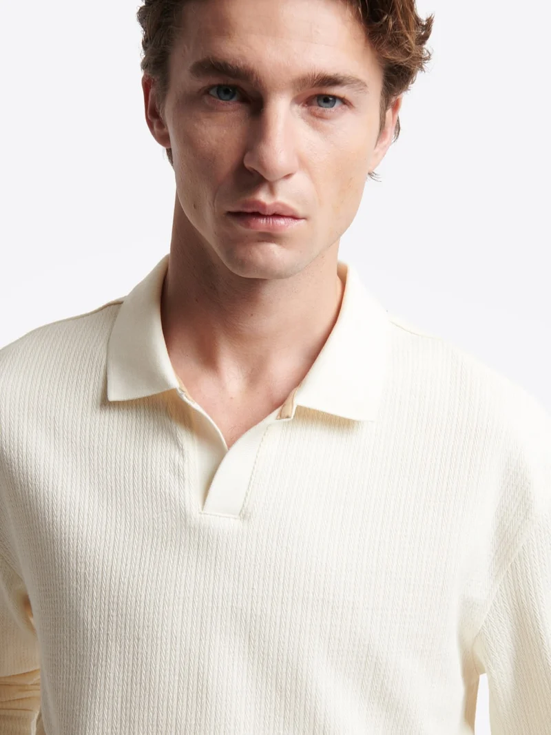 Polo manches longues en coton