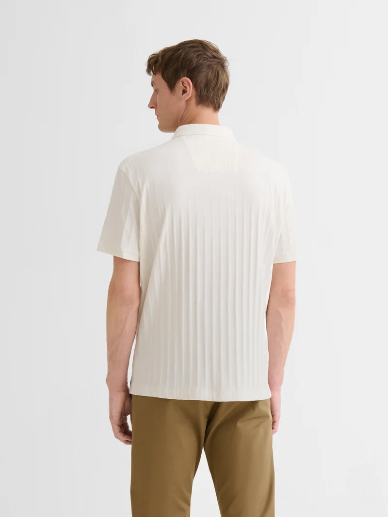 Polo boutonné en seersucker