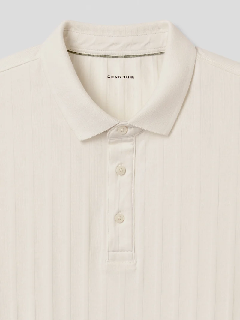 Polo boutonné en seersucker