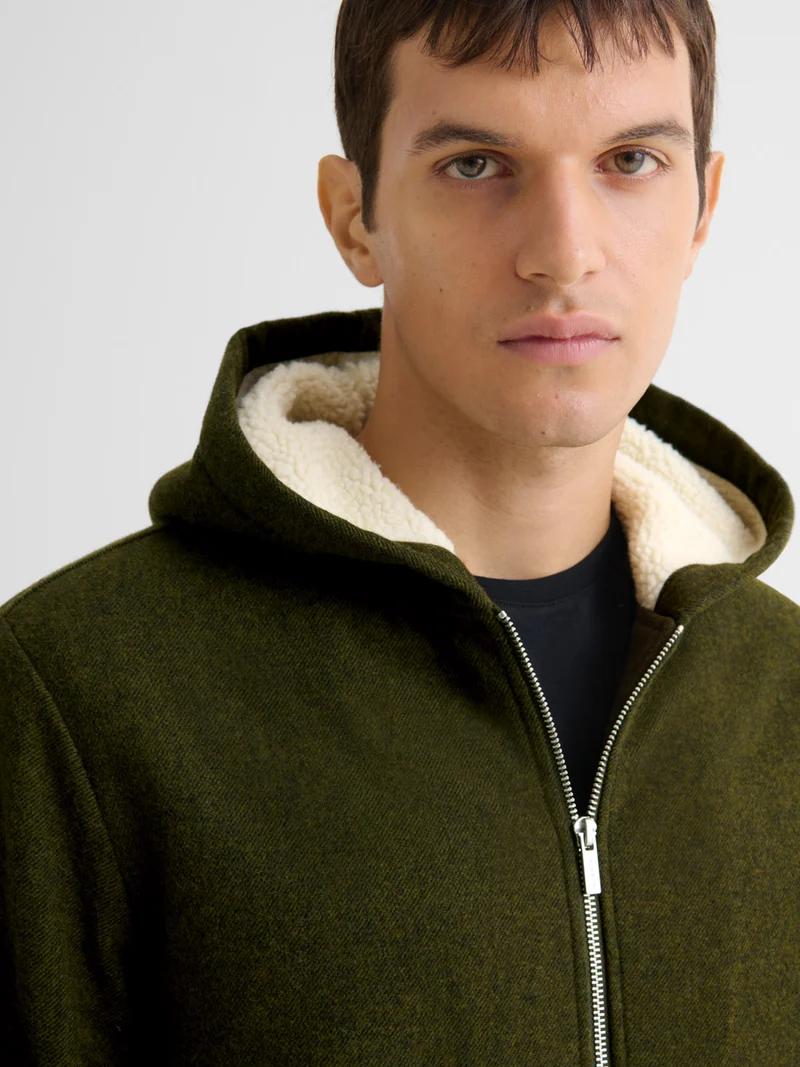 Blouson zippé à capuche en sherpa