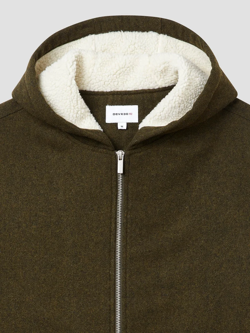 Blouson zippé à capuche en sherpa