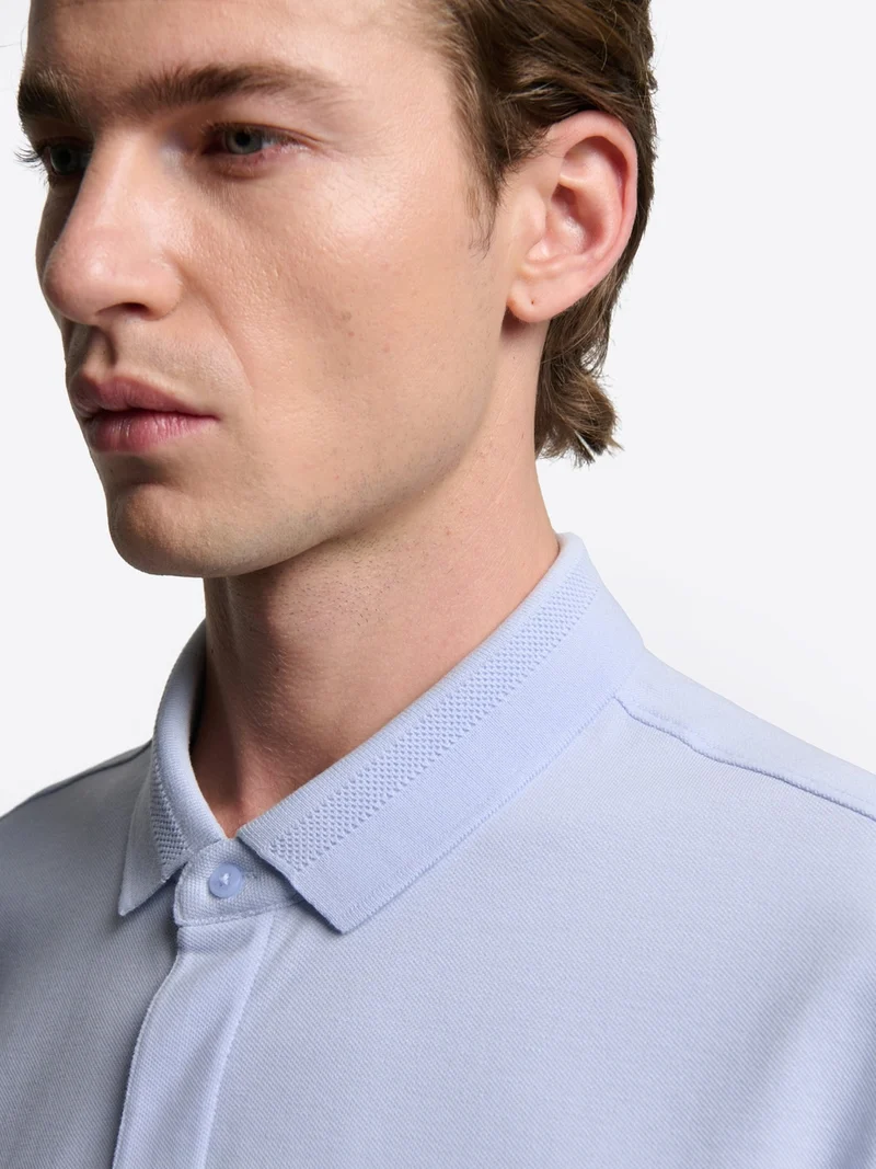 Polo col boutonné en coton premium