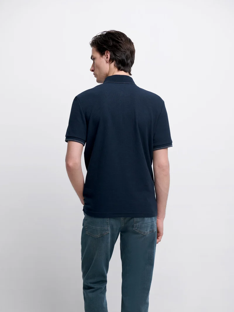 Polo col boutonné gauffré