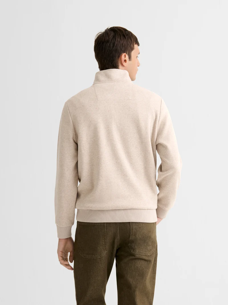 Sweat col montant zippé chiné