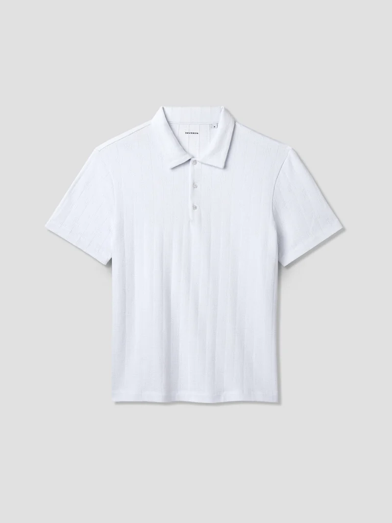 Polo col boutonné en maille rayée
